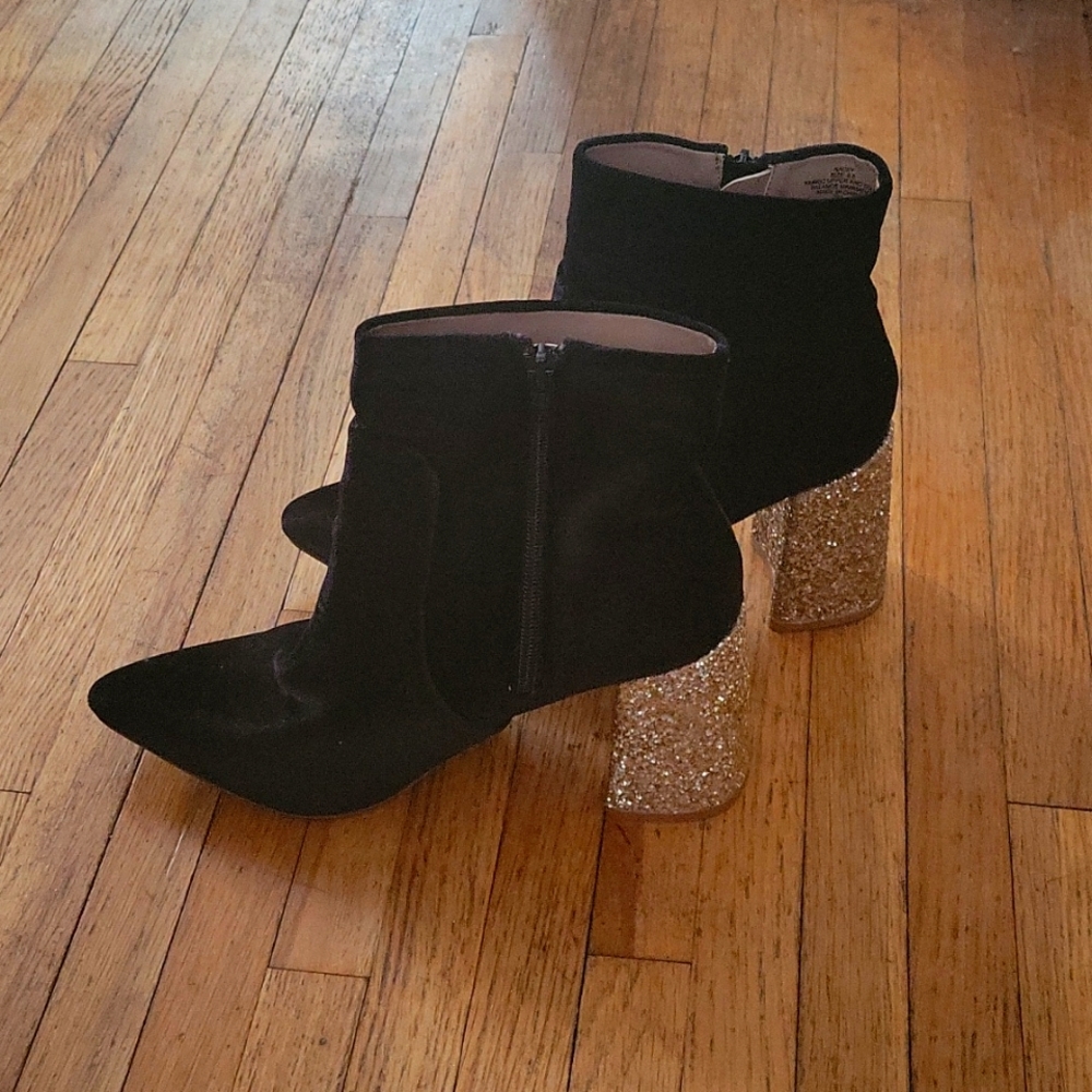 Black velvet booties with gold sparkly heel